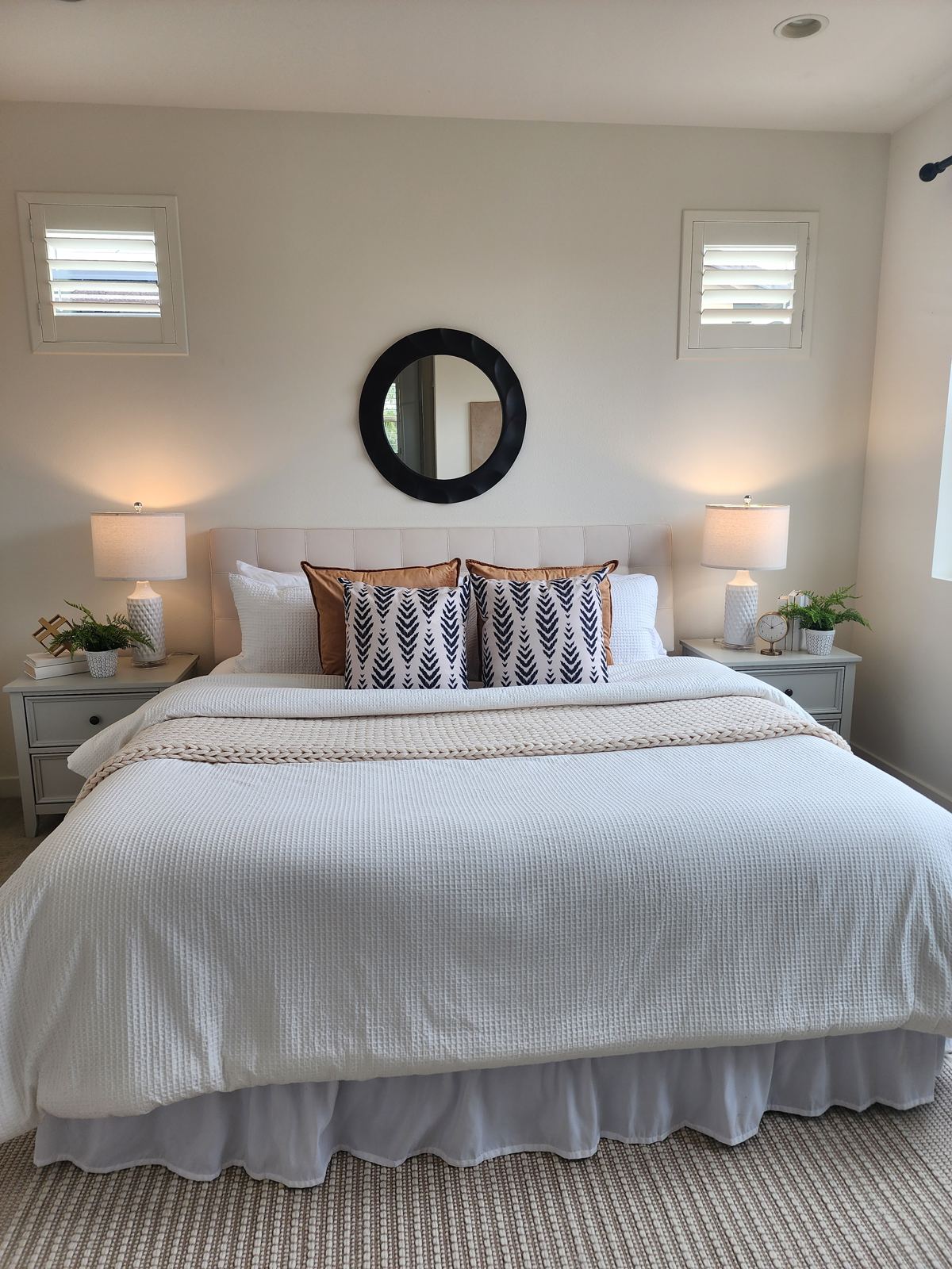 Staged primary bedroom in a vacant Lake Forest single-family home